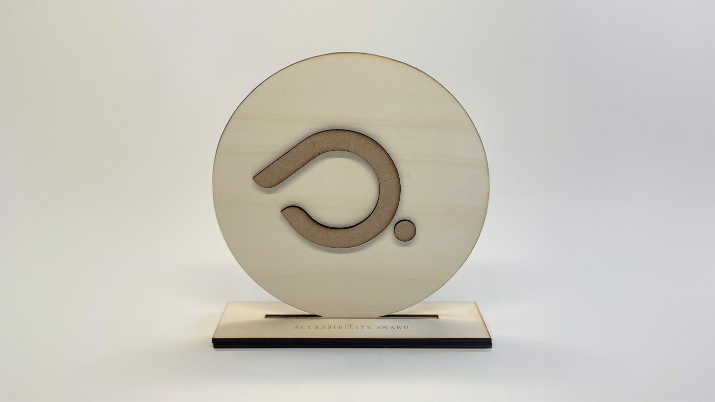 troféu redondo com símbolo