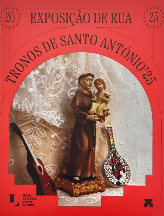 Red cover with a sculpture of Saint Anthony at the center.
